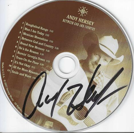 Andy Hersey: Between God And Country Signed w/ Front Artwork